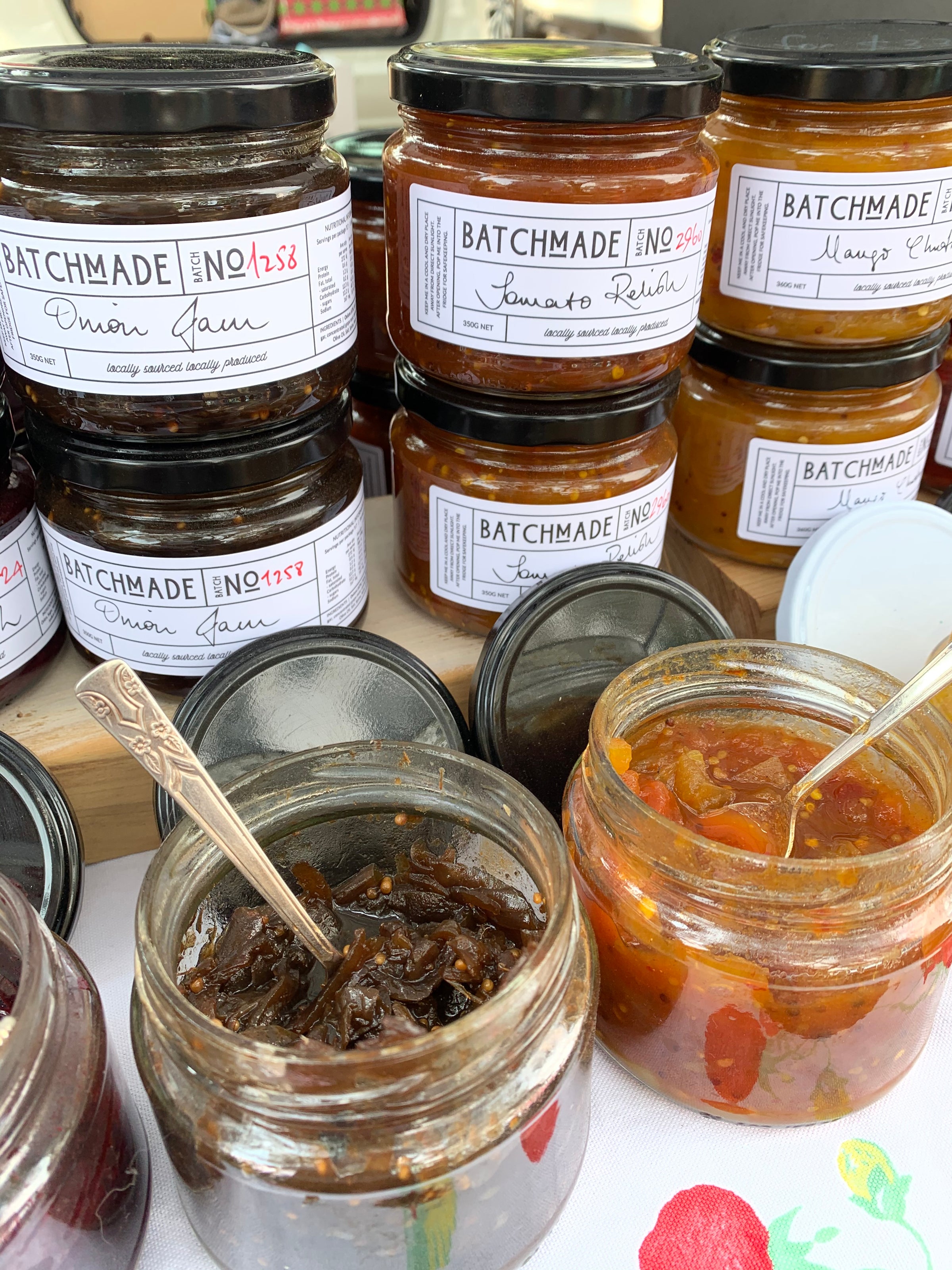 BatchMade onion jam and tomato relish open jar with teaspoon