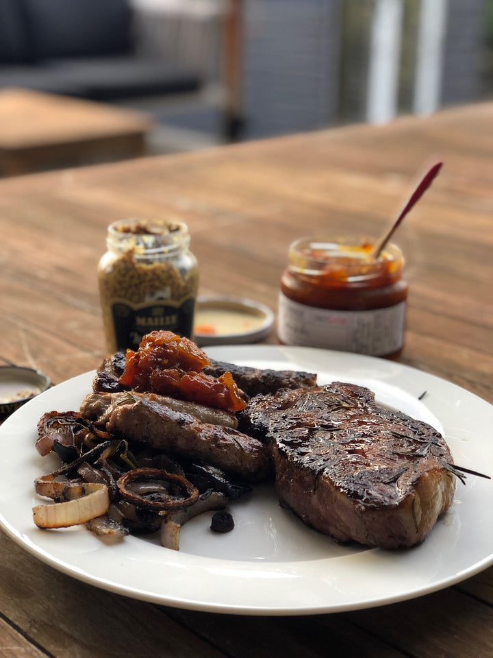 BBQ meat with open jar of BatchMade tomato relish